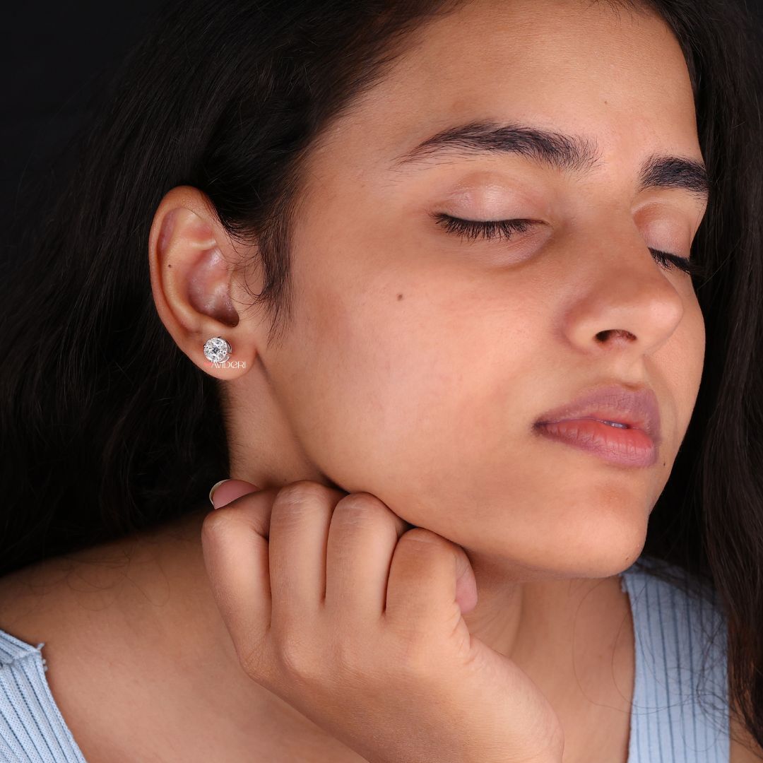Marquise Side Stone Earrings balance shape and brilliance with tapered side stones.