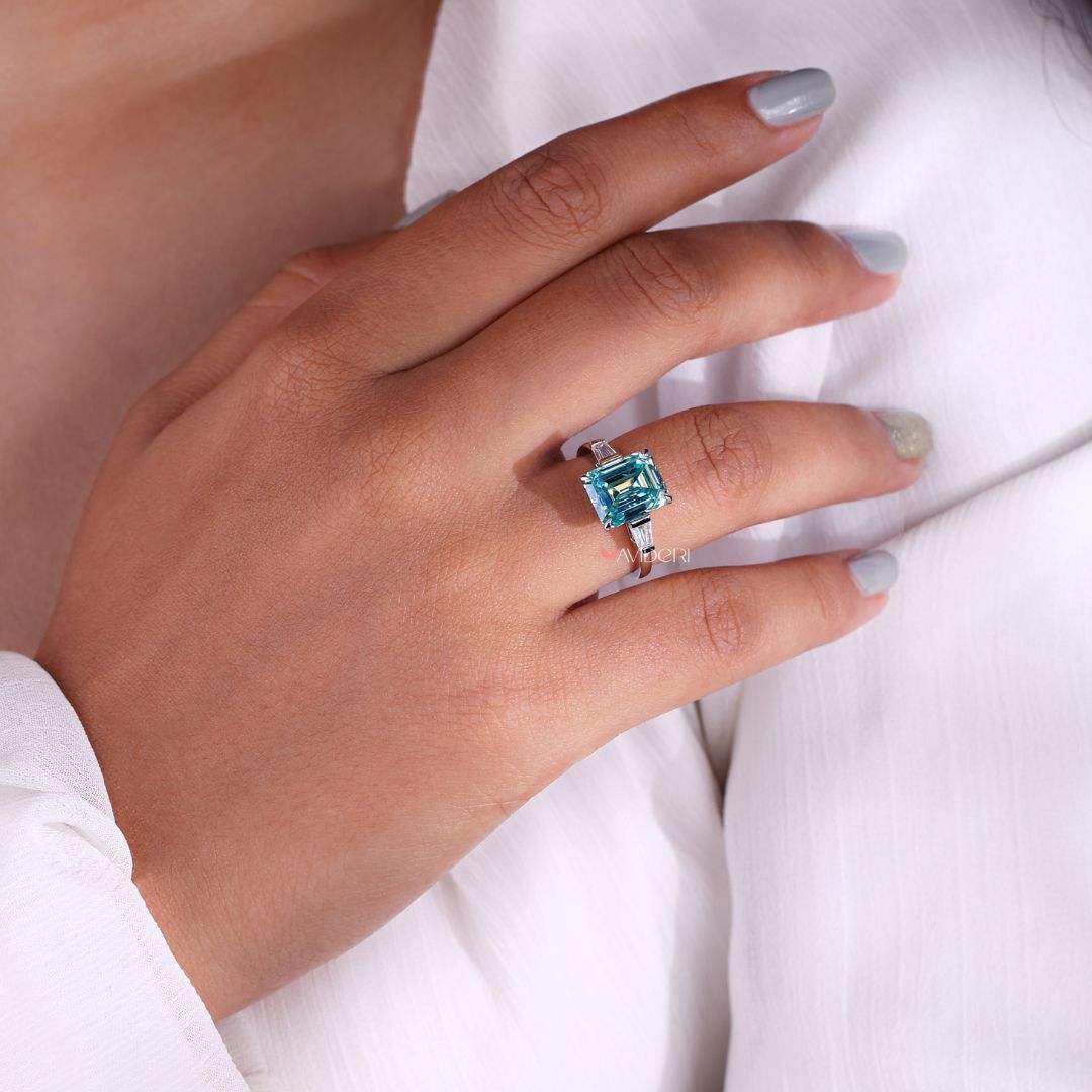 Moissanite ring emerald cut with a brilliant shine.