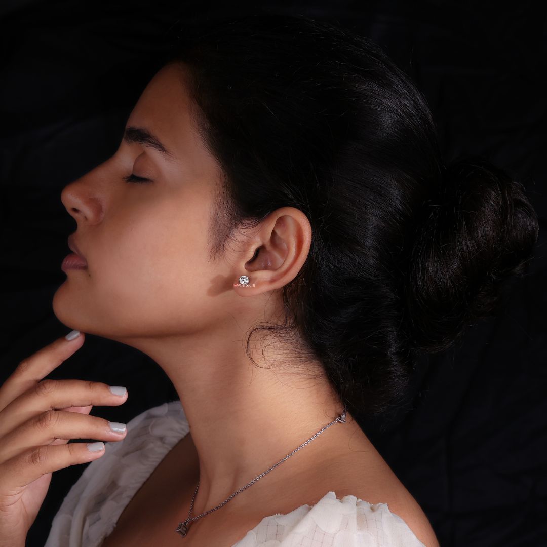 Elegant round cut earrings add a timeless charm to your everyday or special occasion look with ease.