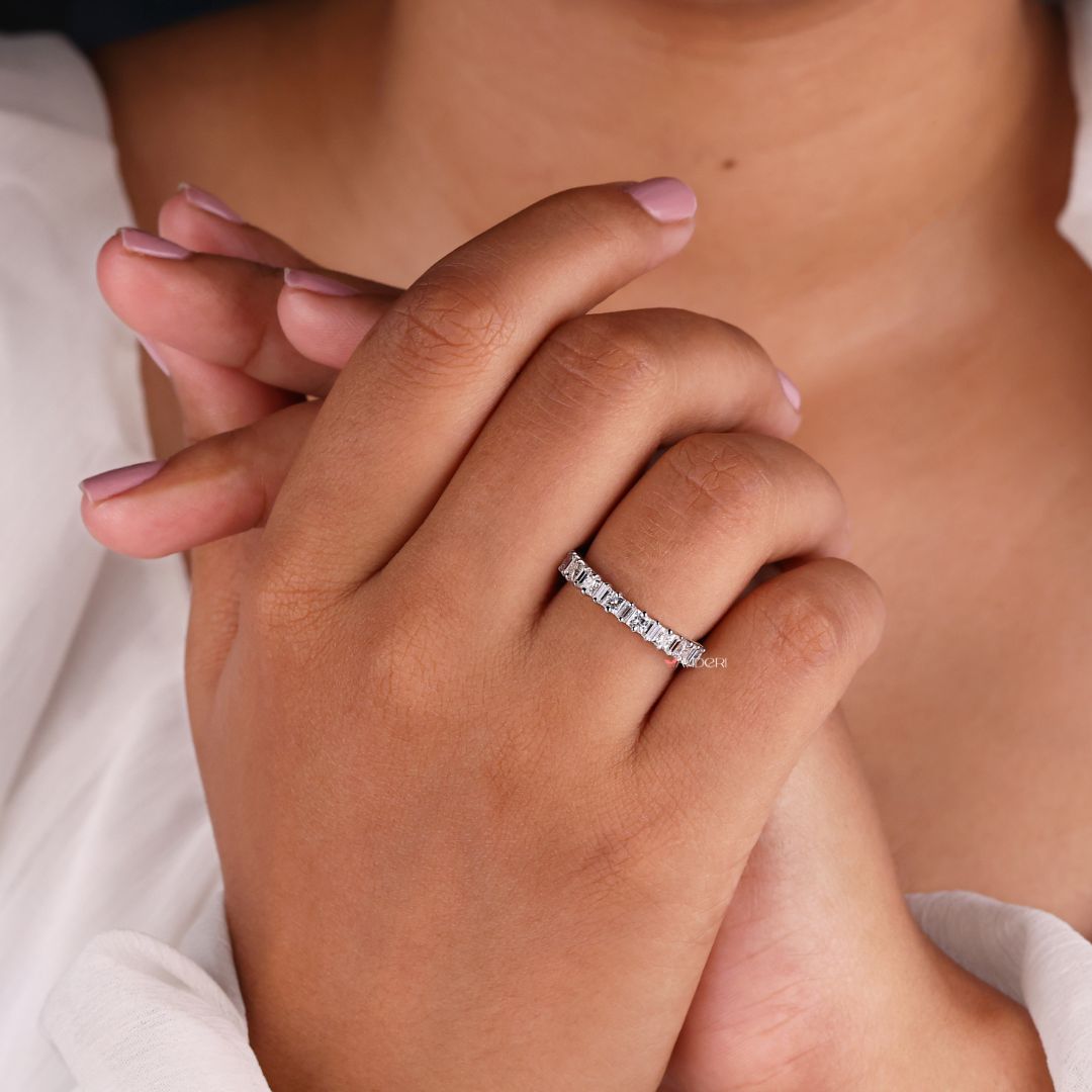 White gold band complements any engagement ring with a clean and classic design.