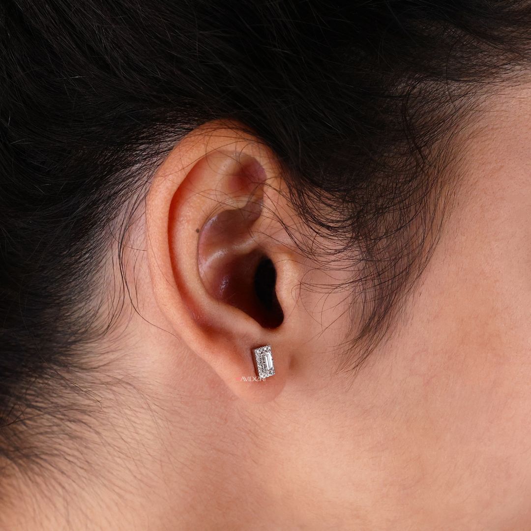 Moissanite stud earrings with baguette cut Moissanite in white gold settings.