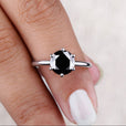 Round cut ring with a brilliant sparkle, perfect for engagement.