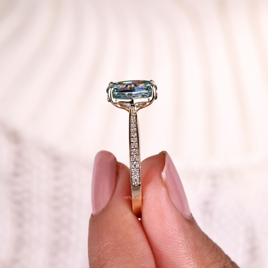 She flaunts an elegant oval step cut ring at dinner.