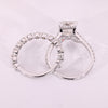 White gold bridal set with radiant cut moissanite.