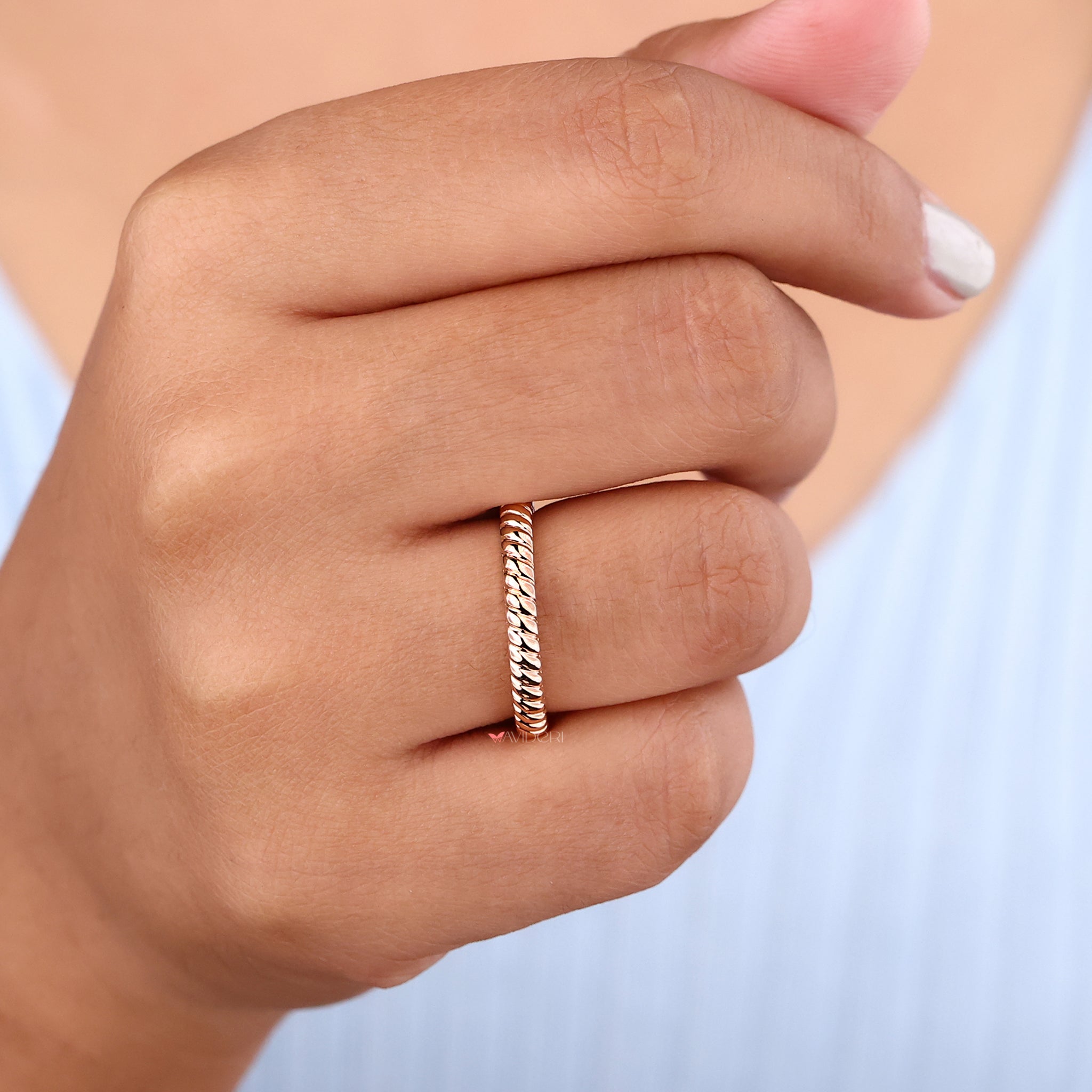 Round wedding band delivers timeless elegance with a classic, smooth profile.