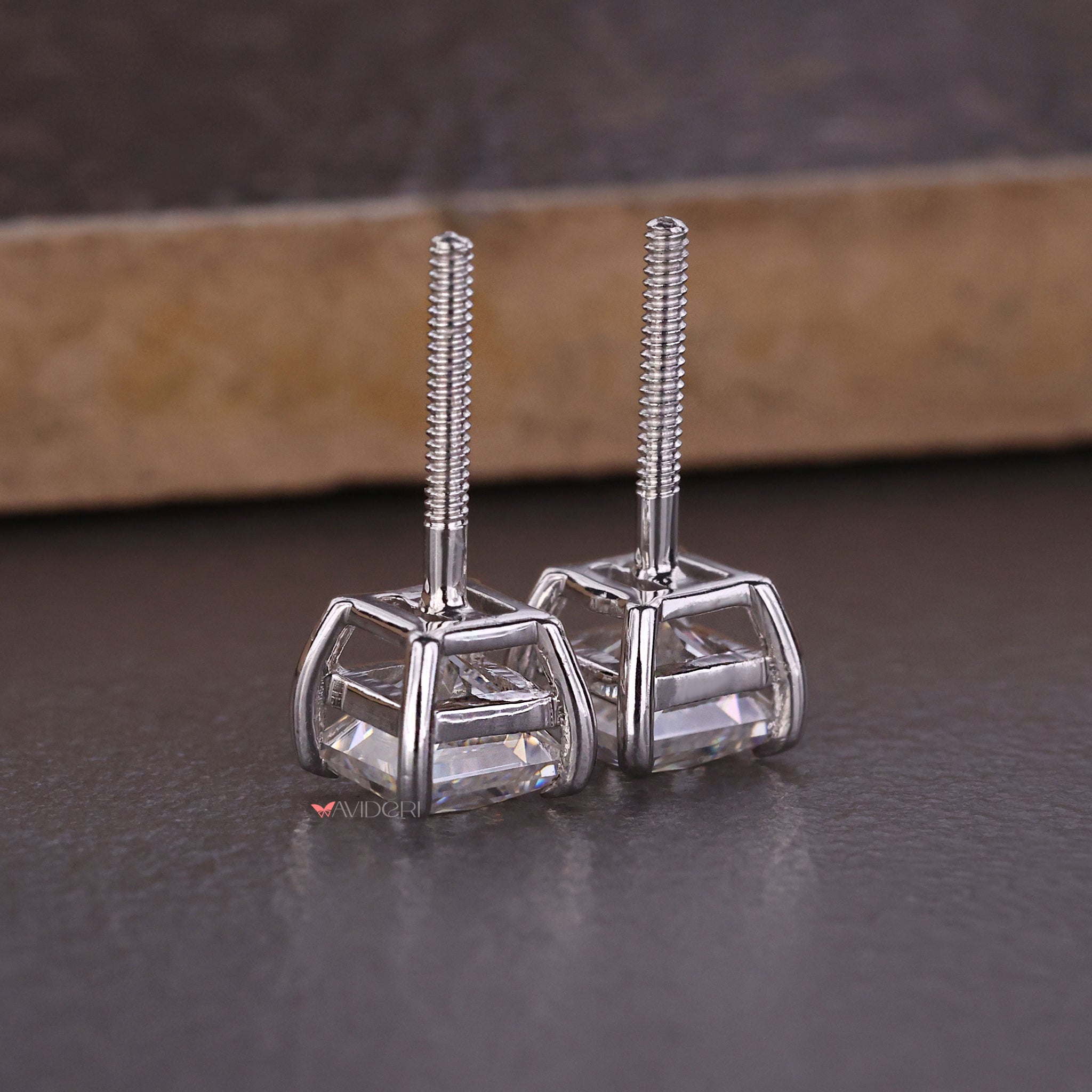 The 4 claw prong earrings provide a secure and elegant fit.