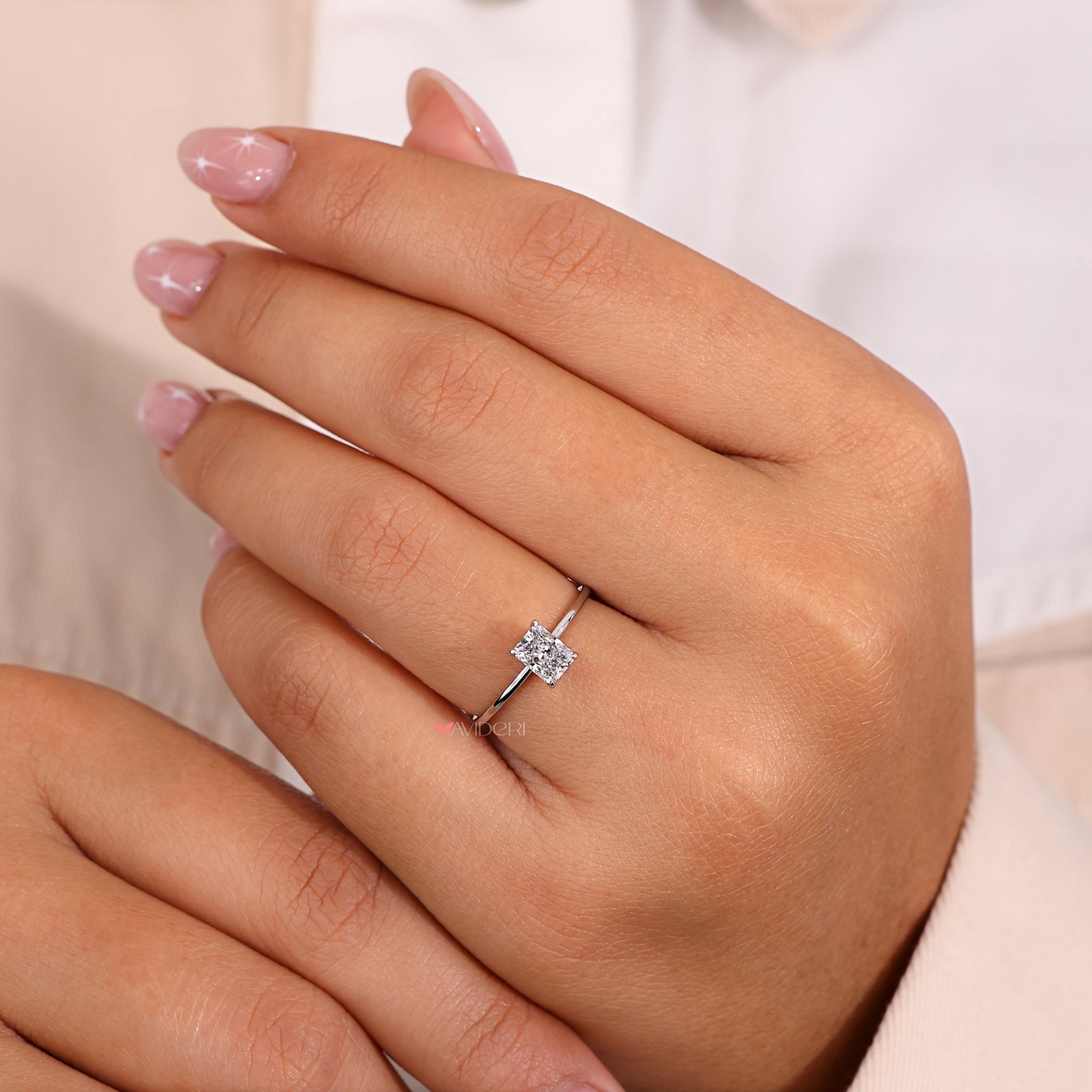 Radiant diamond ring featuring a brilliant centerpiece