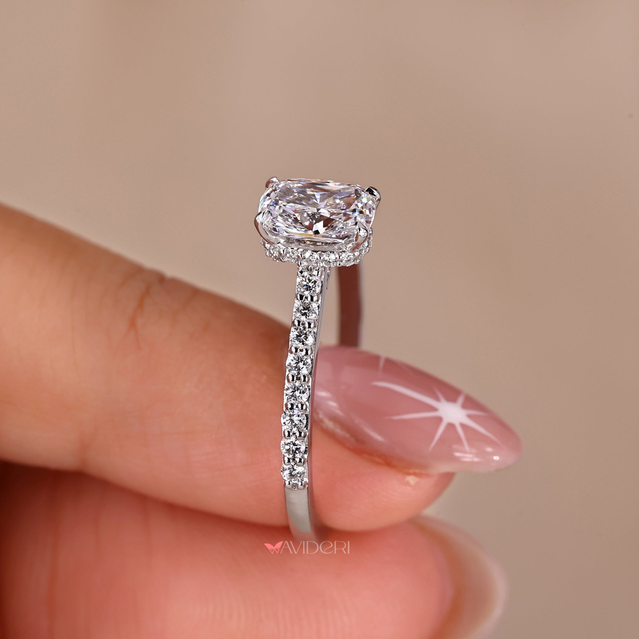 Hidden halo engagement ring with a stunning cushion cut