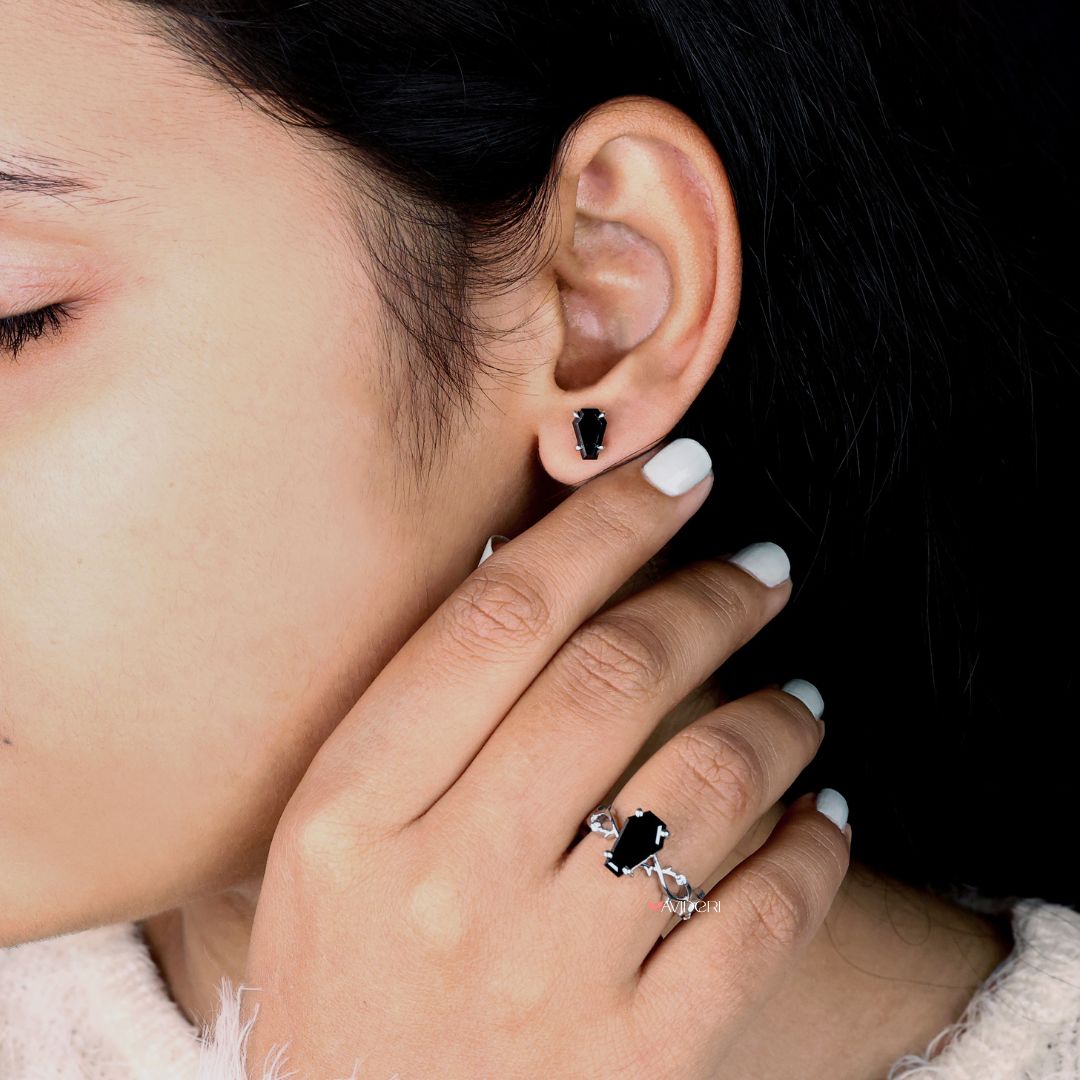 Coffin earrings with moissanite stud earrings for a sparkling, modern design.