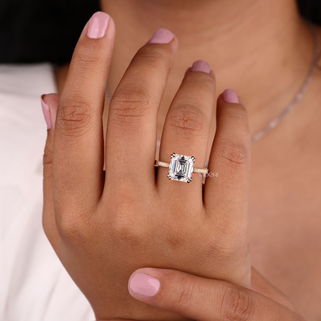 Asscher cut moissanite ring set in yellow gold