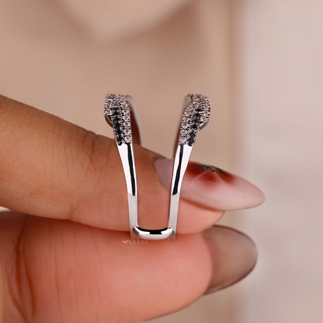 The black moissanite band adds a bold, unique contrast.