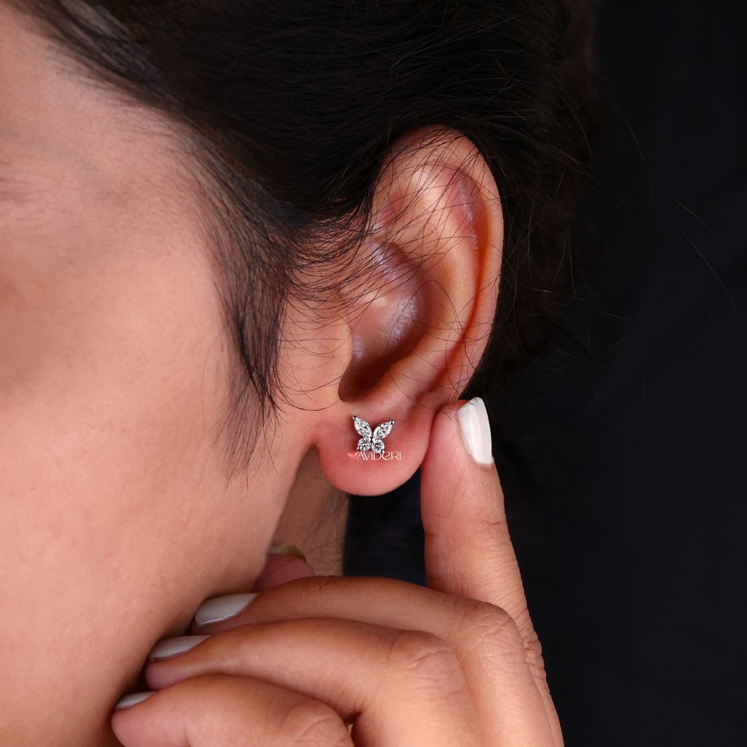 Butterfly stud earrings featuring Marquise Moissanite for a custom touch.