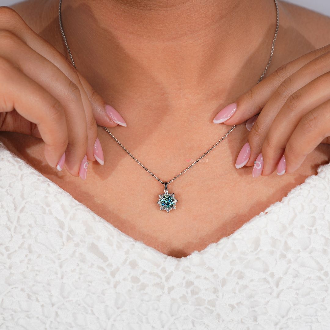 Halo cluster diamond pendant with intricate details.