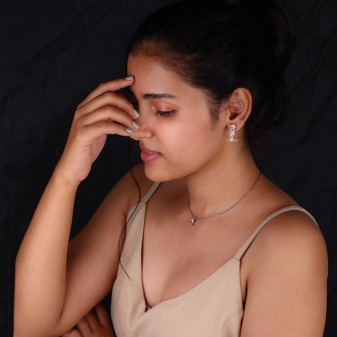 Pear and Marquise Moissanite Earrings, combining the brilliance of pear and marquise Moissanite for a dazzling effect.