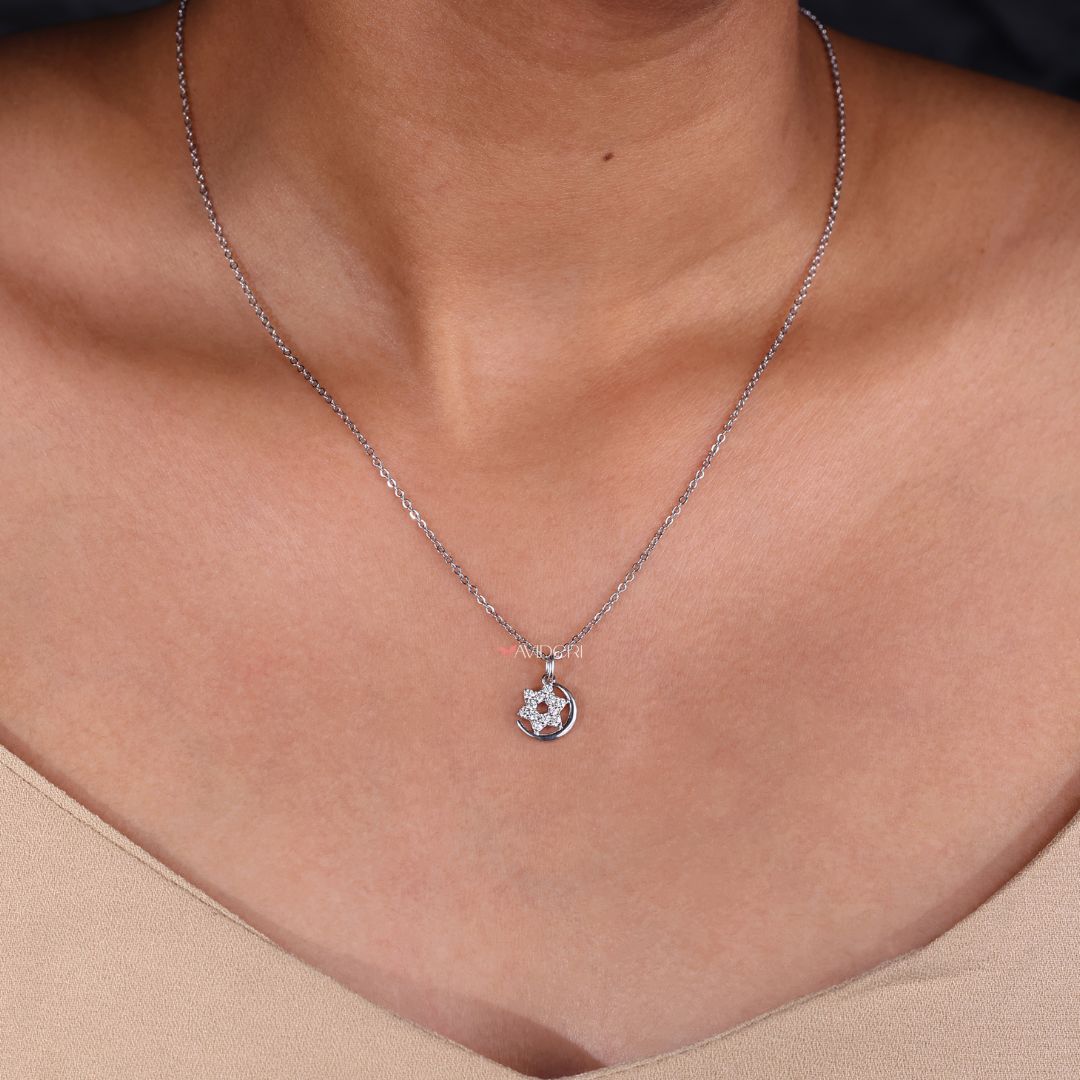 Handmade pendant shaped like the moon and star