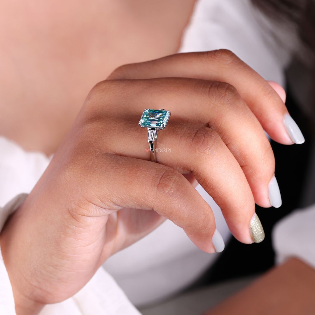 Cyan blue moissanite ring creating a striking appearance.