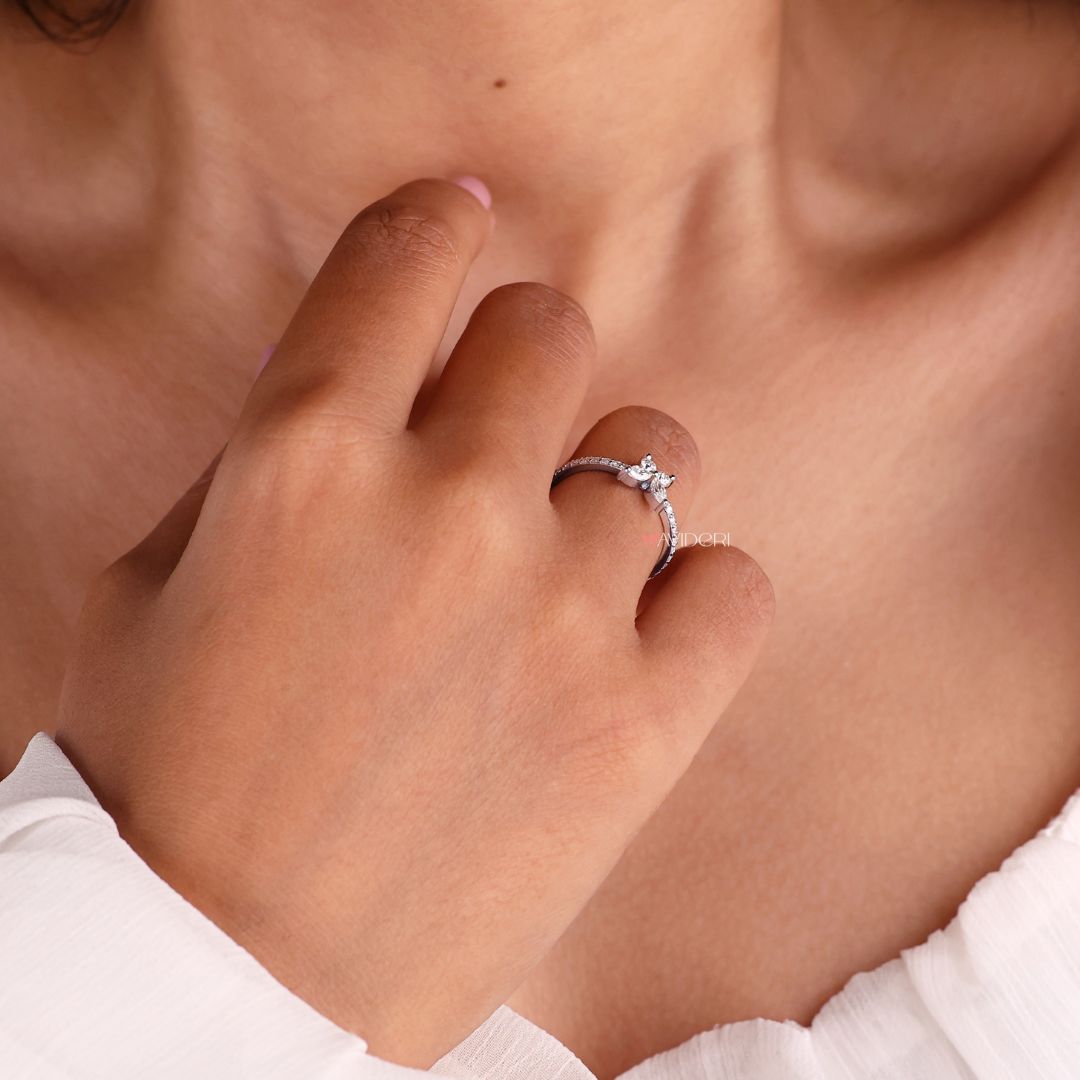 White gold ring with a butterfly-inspired setting