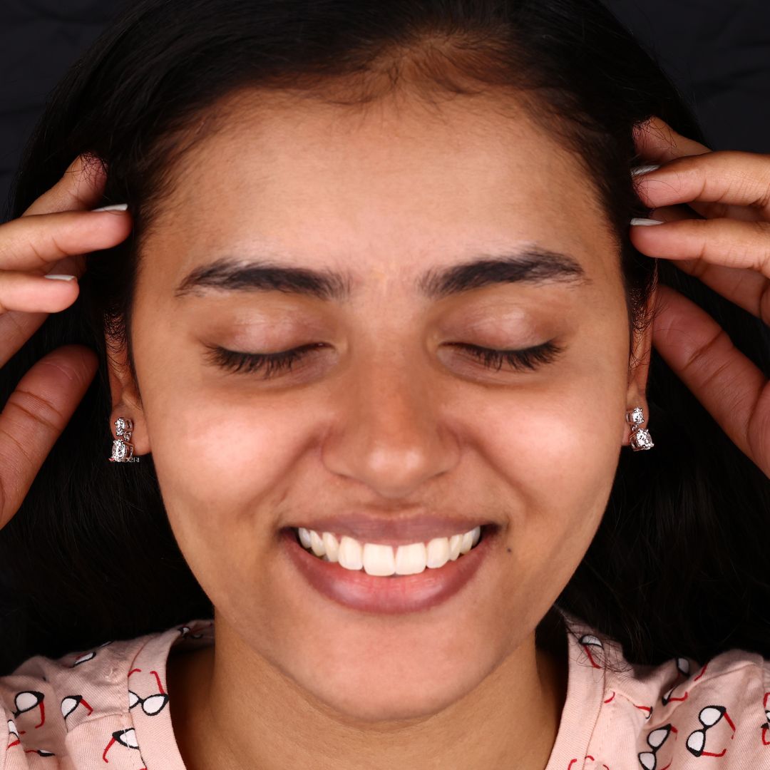 Wedding gifts for women with stunning round cut Moissanite drop earrings.