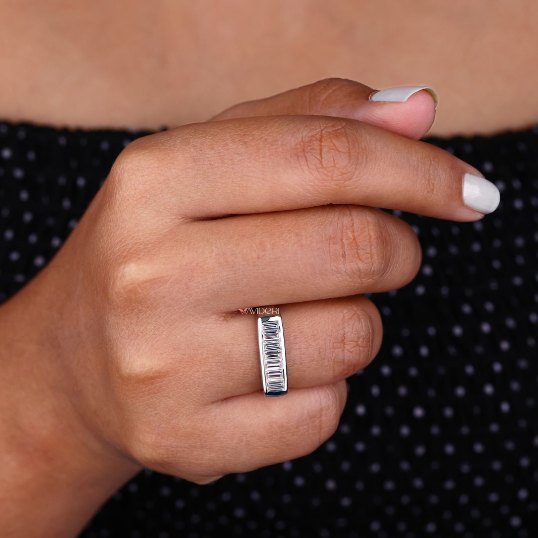 Designer wedding band blends luxury craftsmanship with intricate detailing and unique design.