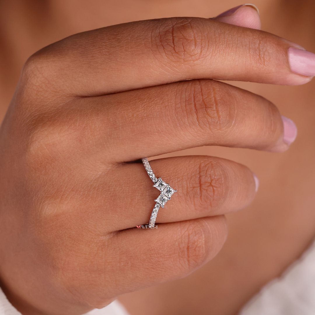 Chevron wedding band offers a unique angular design with continuous sparkle.