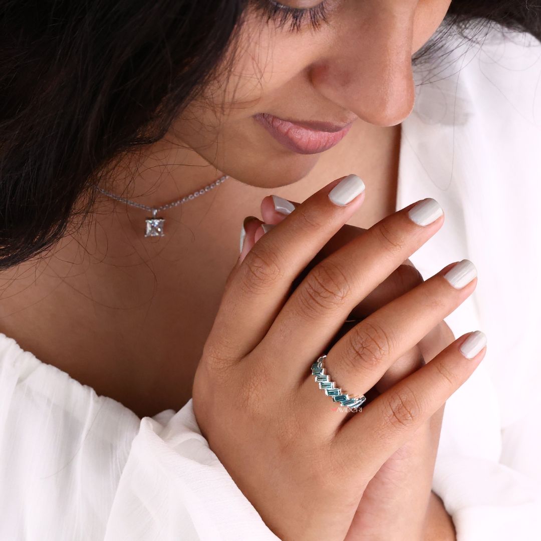 Baguette wedding band adds sleek lines with beautifully cut stones for a timeless look.