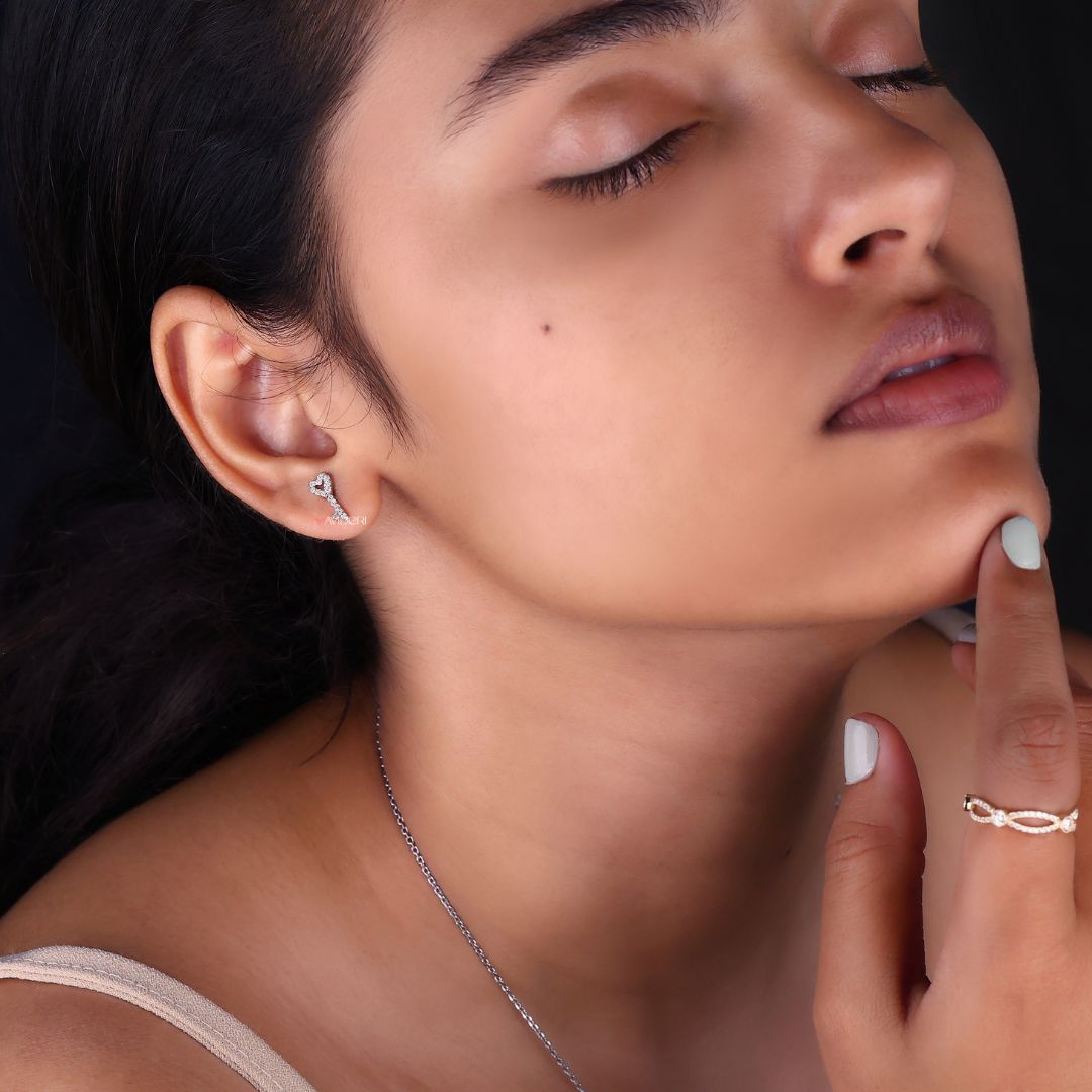 Pear and Marquise Moissanite Earrings, combining the brilliance of pear and marquise Moissanite for a dazzling effect.