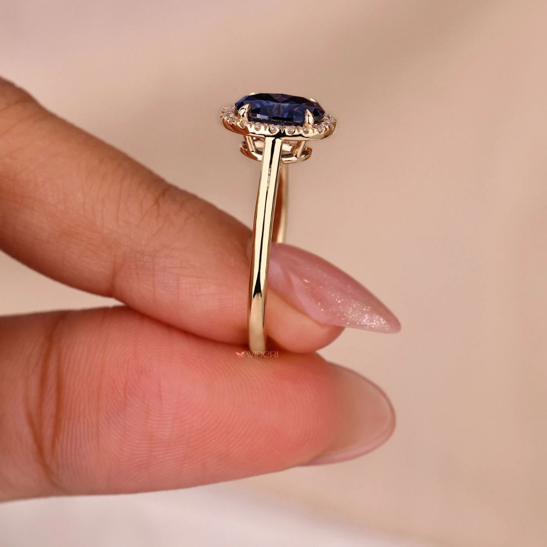 This oval engagement ring highlights timeless beauty with its smooth, rounded shape.