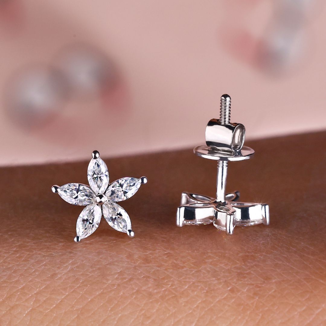 Marquise cut Moissanite flower stud earrings in white gold prong settings.