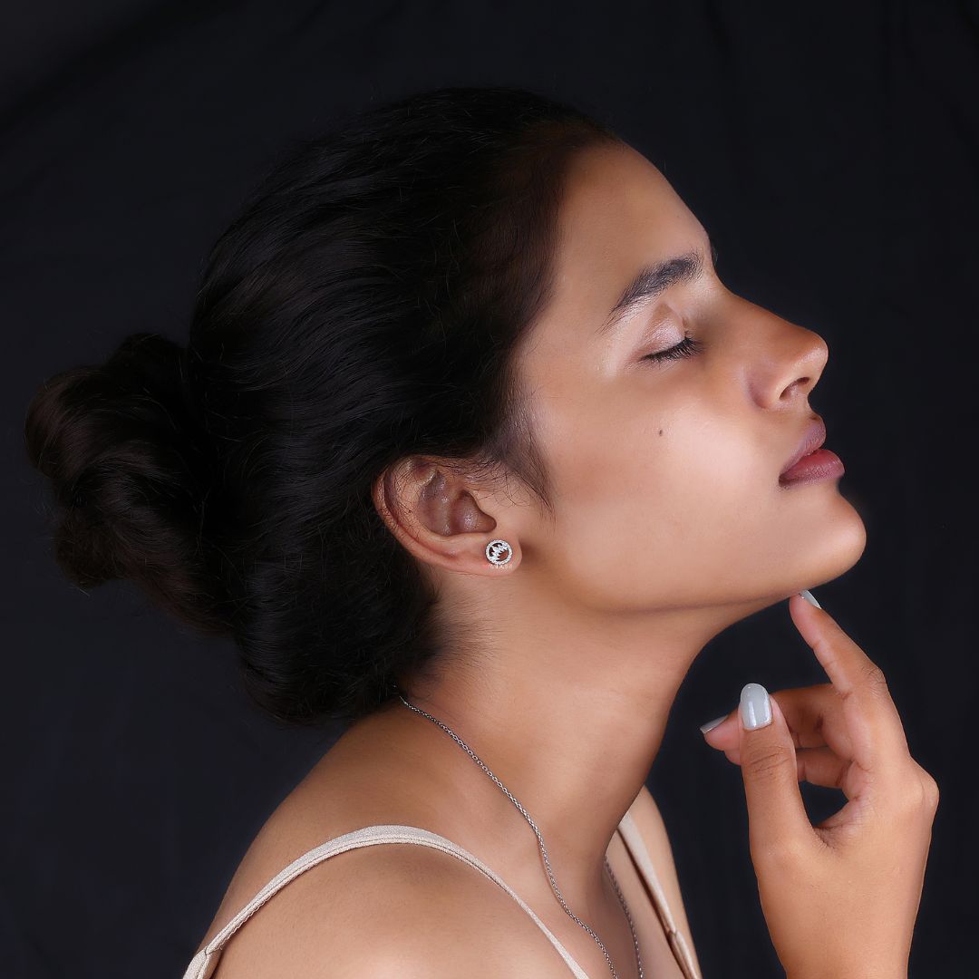 Halo Stud Earrings with marquise cut Moissanite, set in white gold for a unique look.