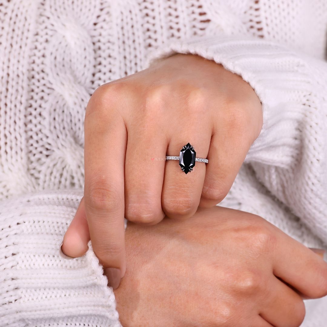 Pave round cut band set with shimmering accent stones.