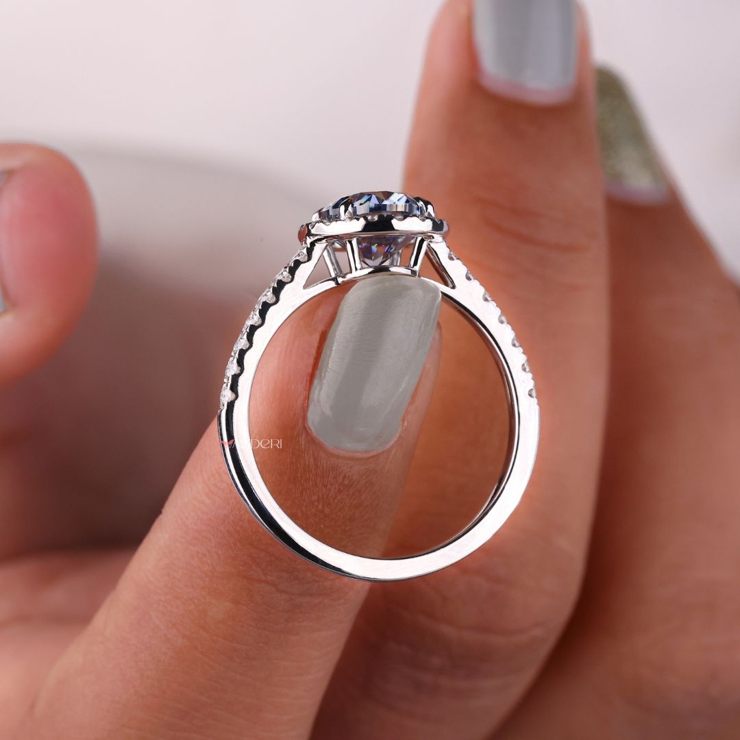 White gold moissanite ring with a brilliant sparkle.