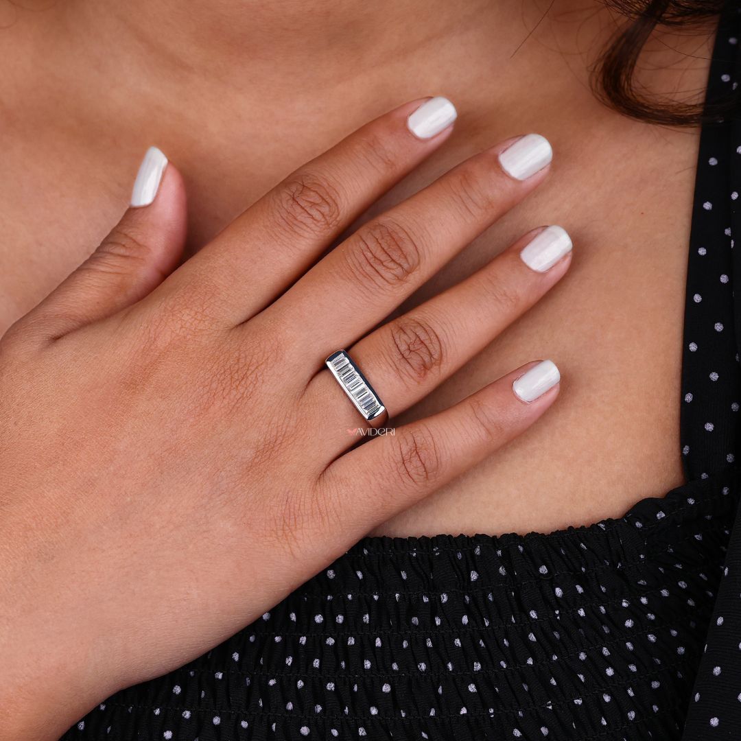 White gold band pairs beautifully with moissanite for an elegant, refined finish.