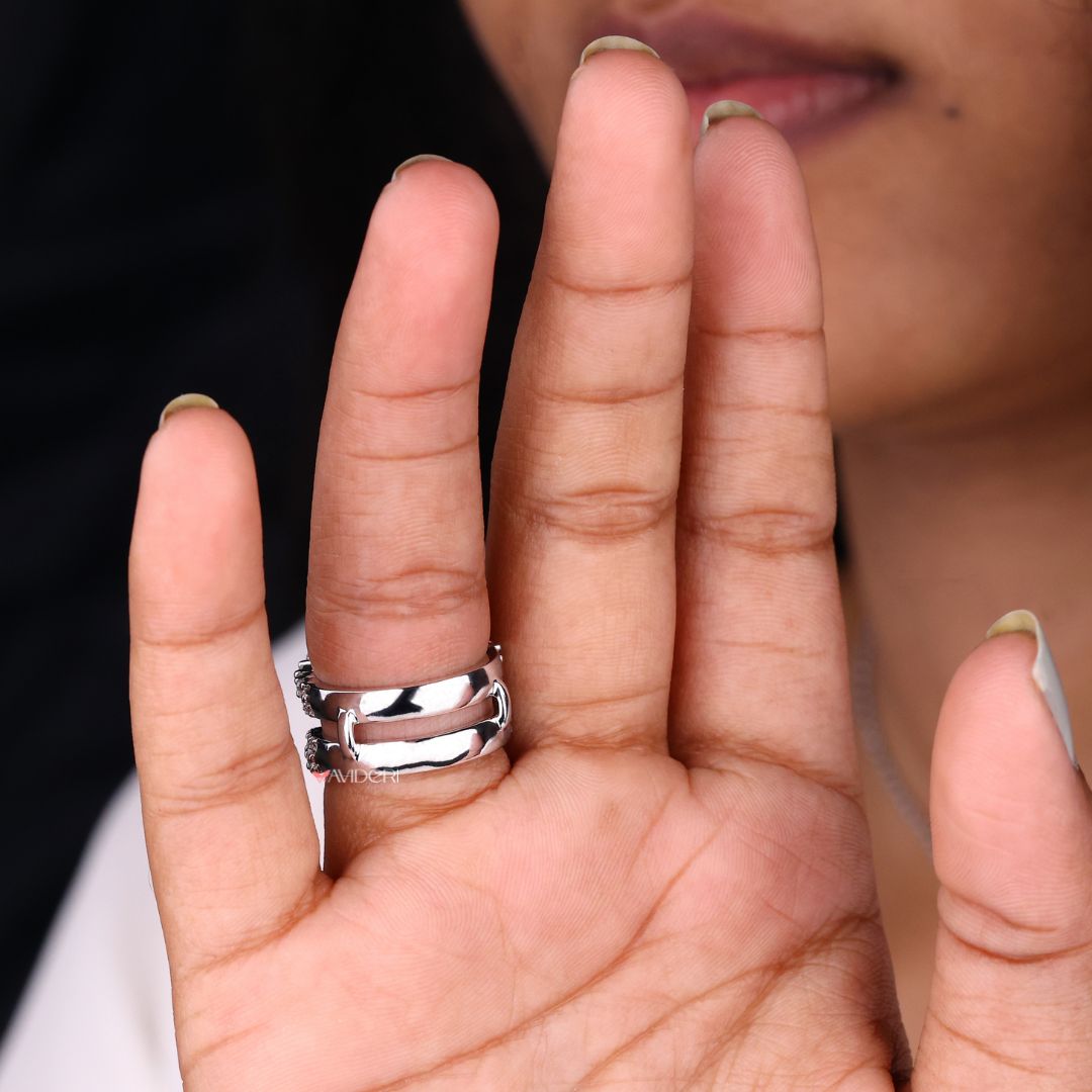 An enhancer design band highlights and complements the engagement ring.