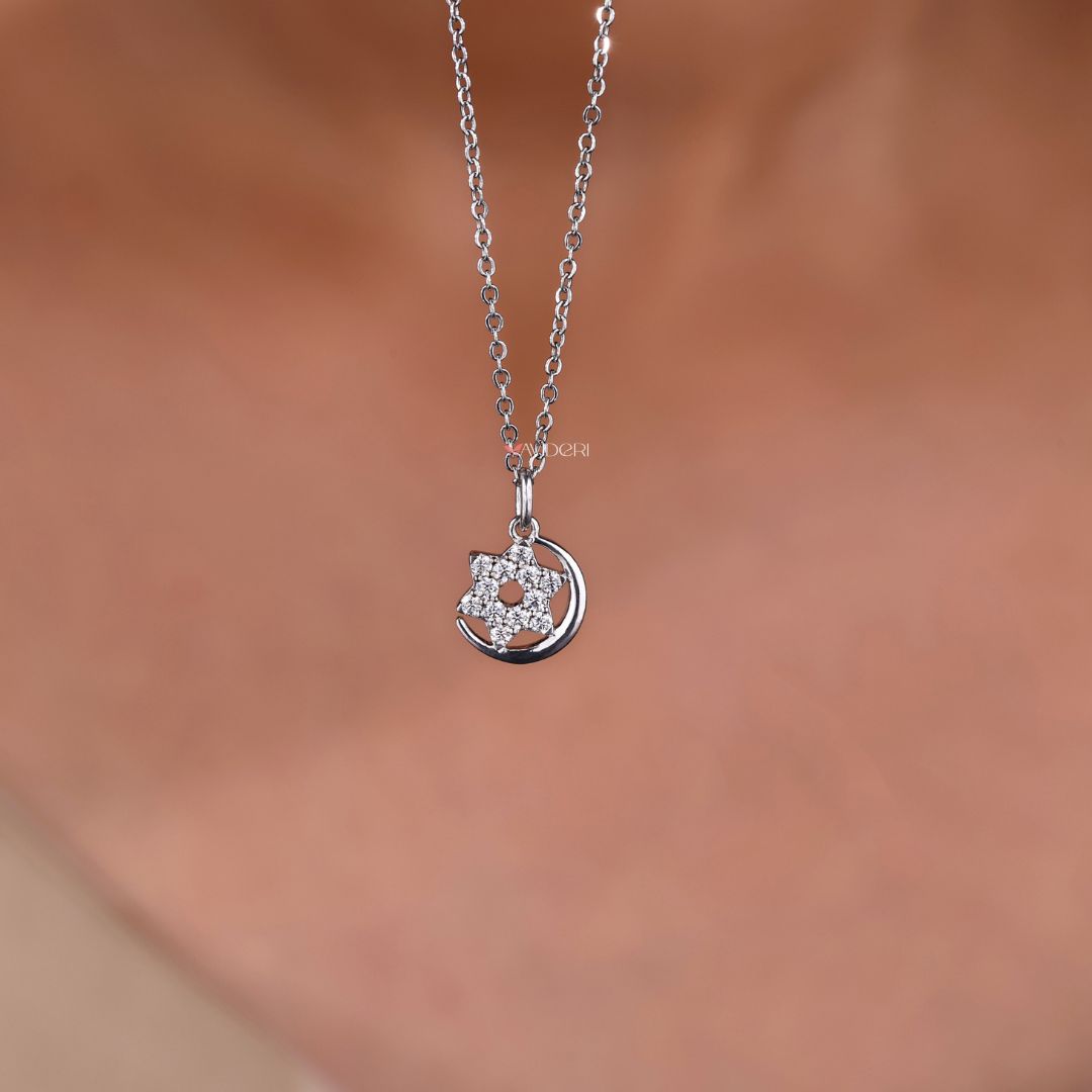 Moon and star gold pendant with radiant shine