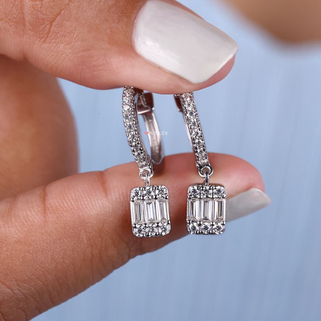 Handmade earrings with baguette and round cut Moissanite for a custom look.