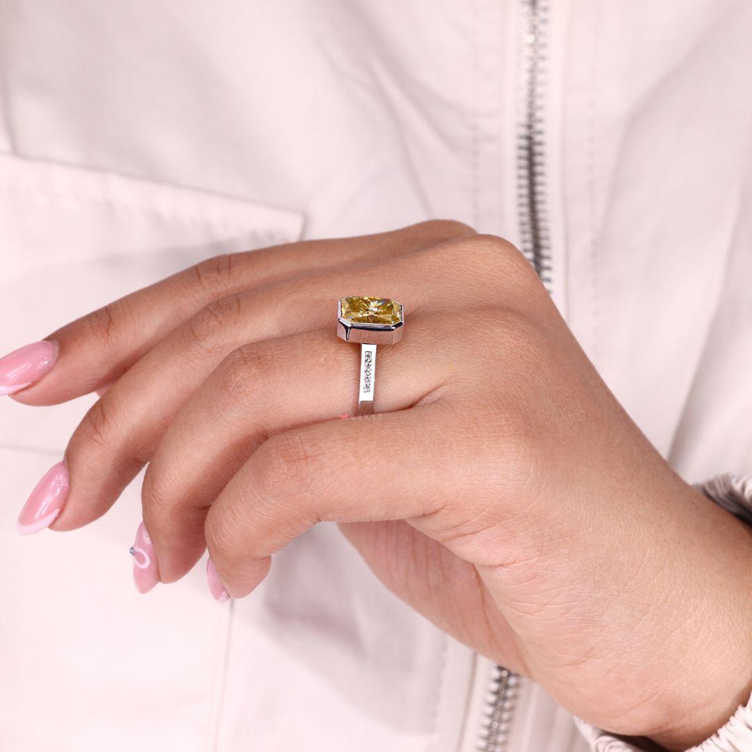 Handmade jewelry featuring a radiant cut engagement ring