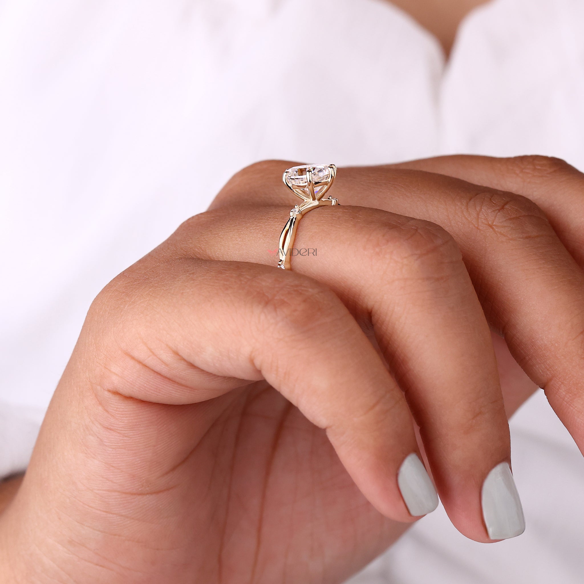 Prong setting ring with secure and timeless diamond placement.