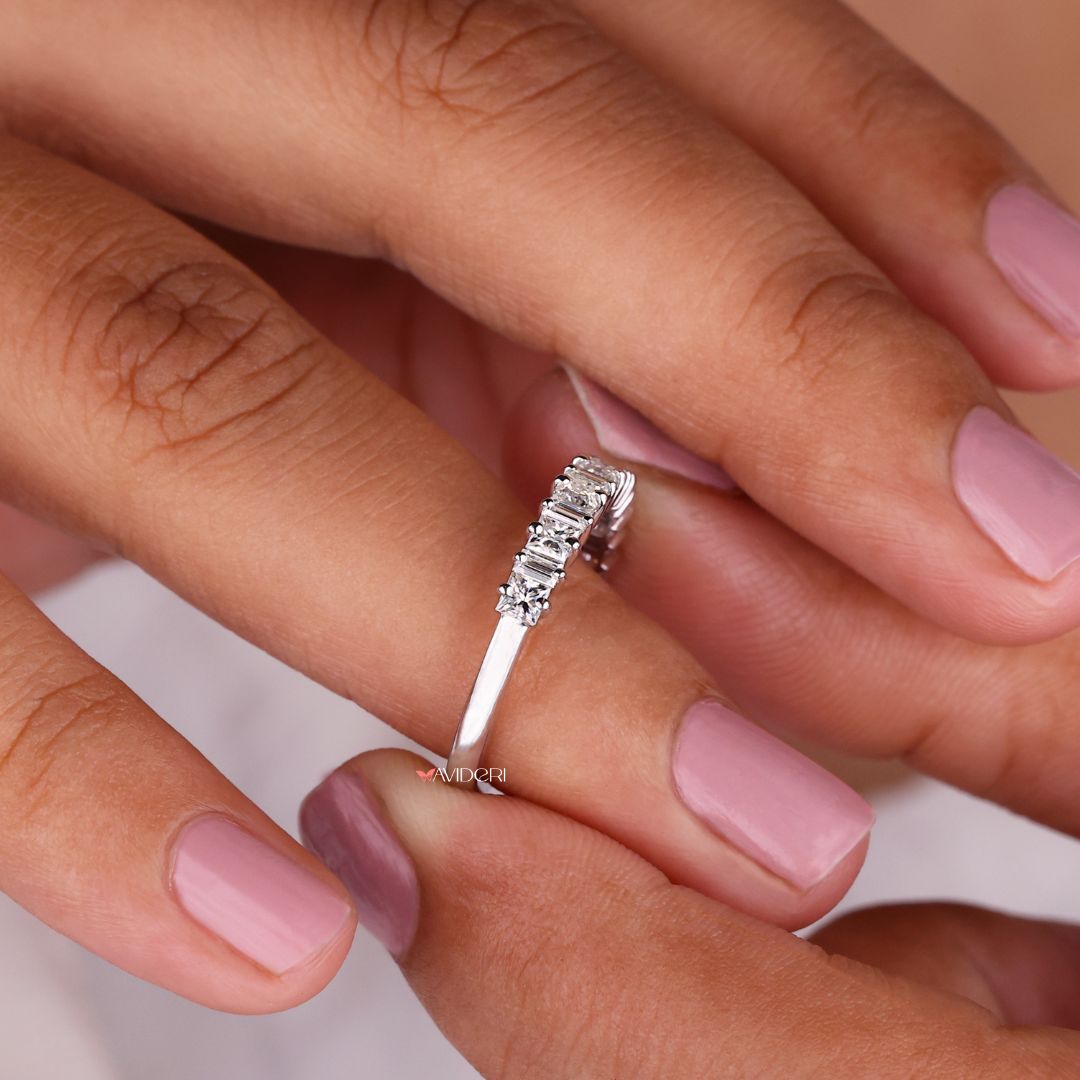 Baguette wedding band showcases elongated stones for a sleek, modern design.