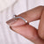 This round moissanite cut band shines with bright sparkle. This round moissanite cut band shines with bright sparkle.