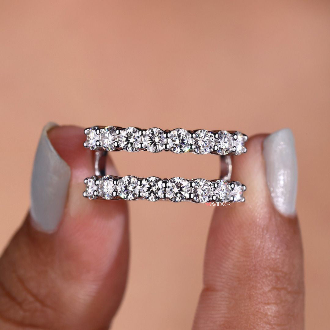 Enhancer design band enhances engagement ring beauty.