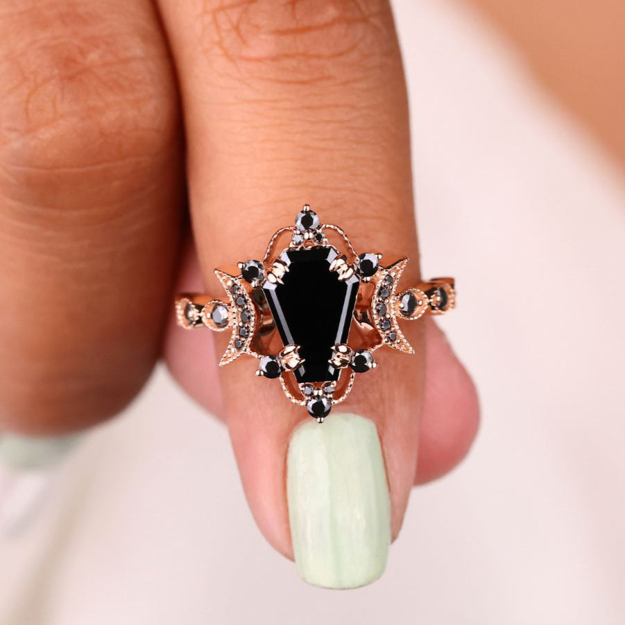 Coffin ring featuring a stunning black moissanite stone for bold elegance.