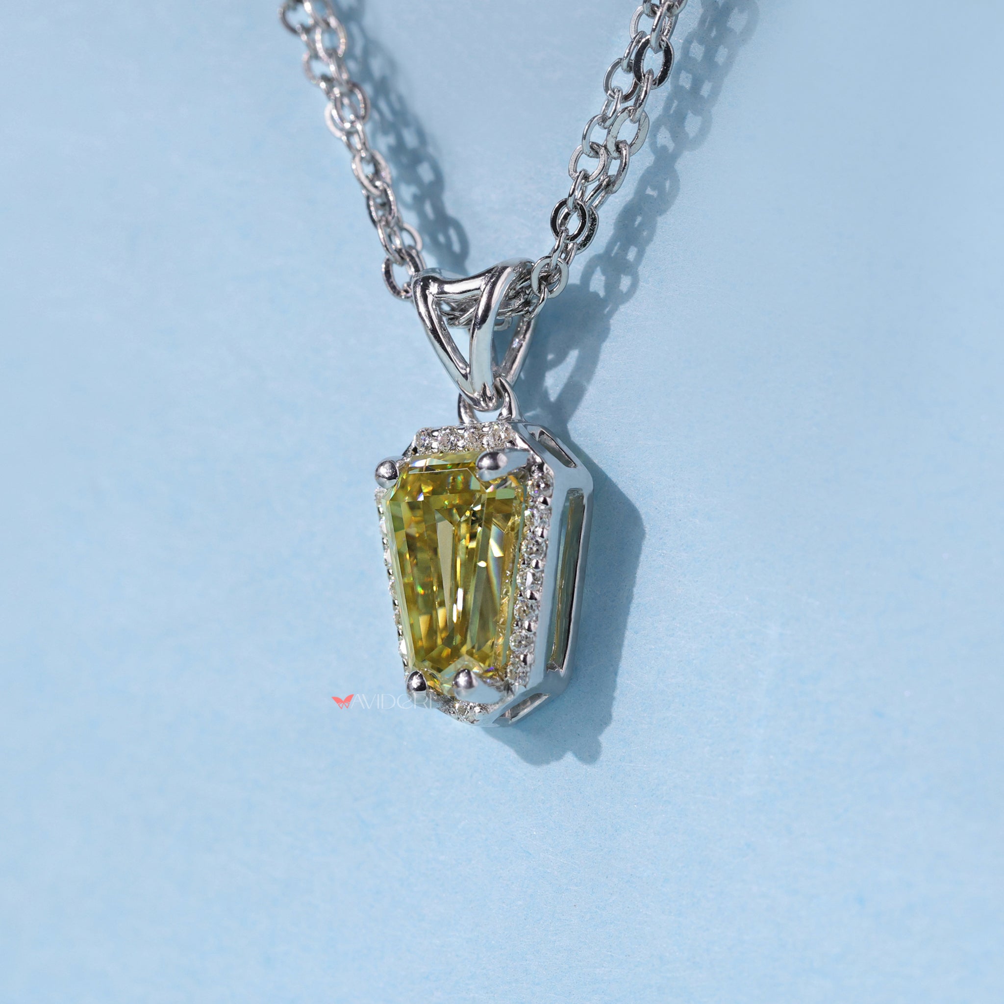 White gold pendant delivers timeless appeal with bright shine.