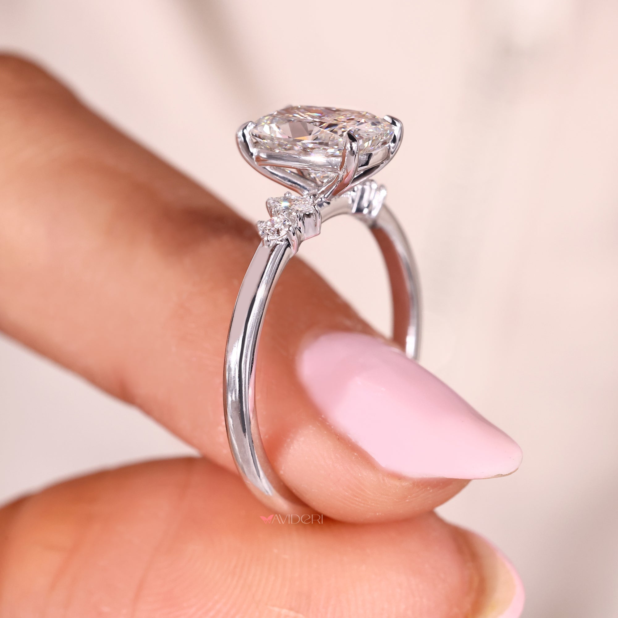 Five stone engagement ring in white gold diamond ring.