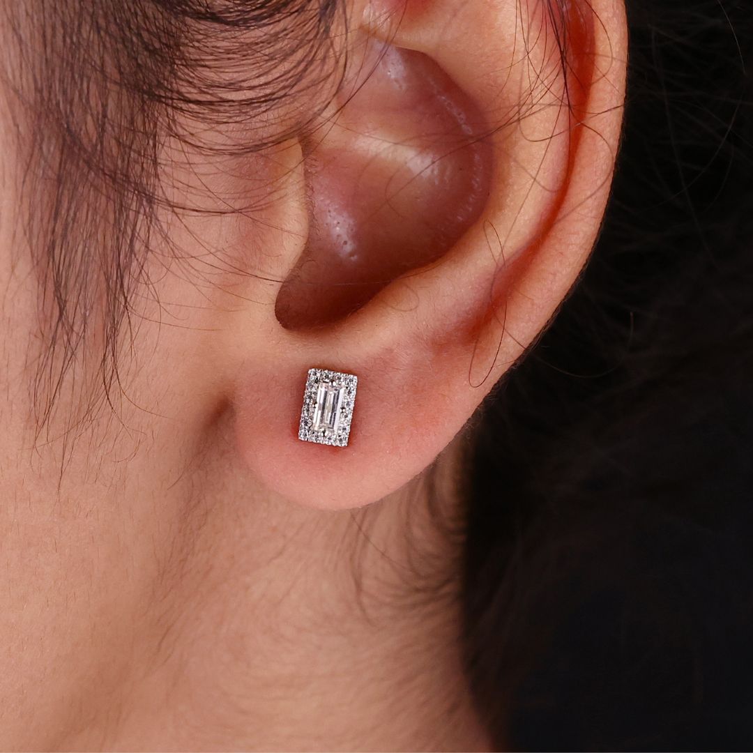 Baguette cut Moissanite earrings with round cut halo for a stunning look.
