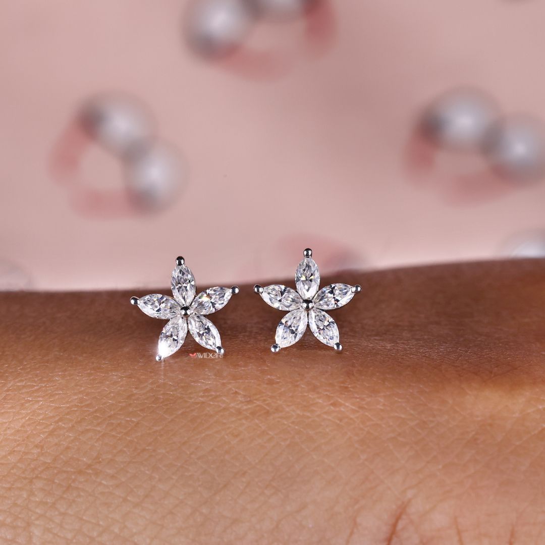 Flower stud earrings with Marquise Moissanite for a unique touch.