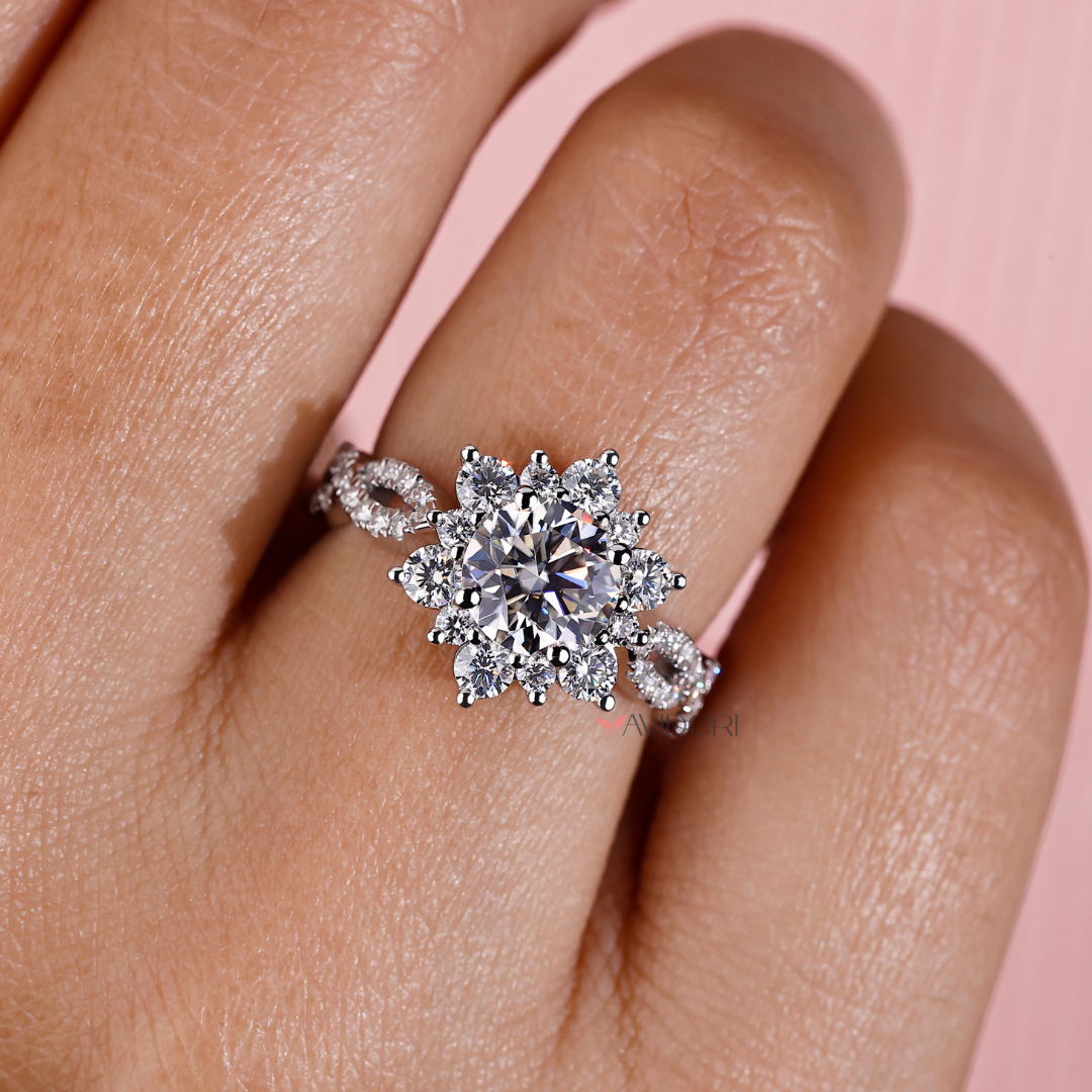 A twisted pave set ring adds fine texture and sparkle to its style.