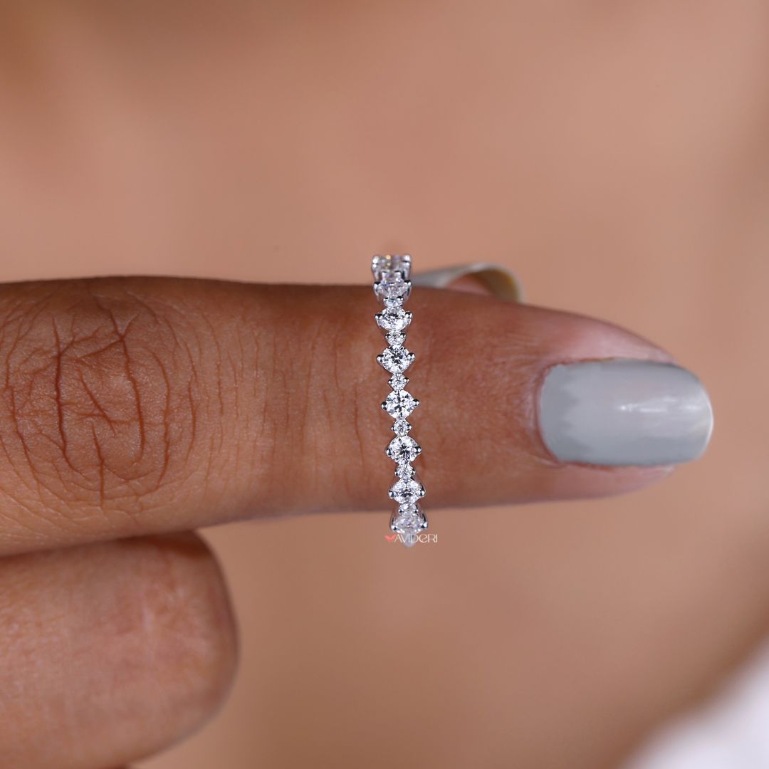 Round cut moissanite offers bright sparkle with a refined and clean appearance.