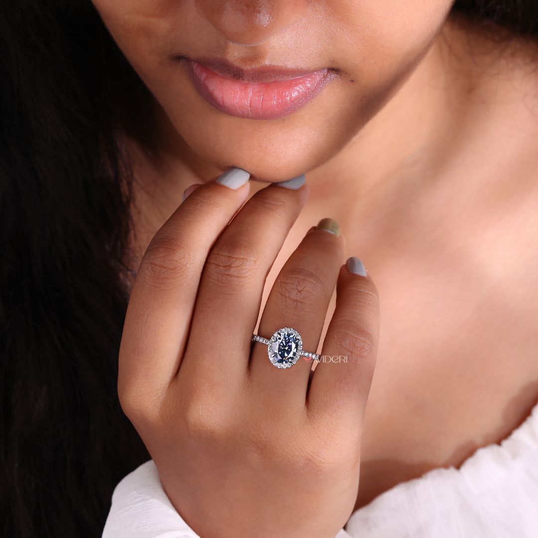 Round cut pave setting ring with brilliant diamonds.
