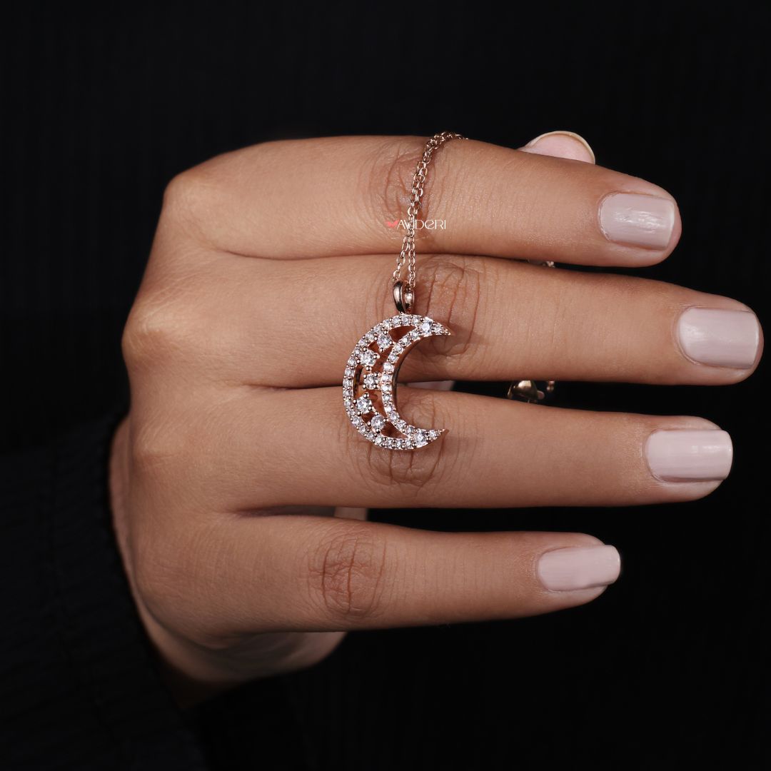 Round cut half moon pendant captures a classic shape with modern flair.