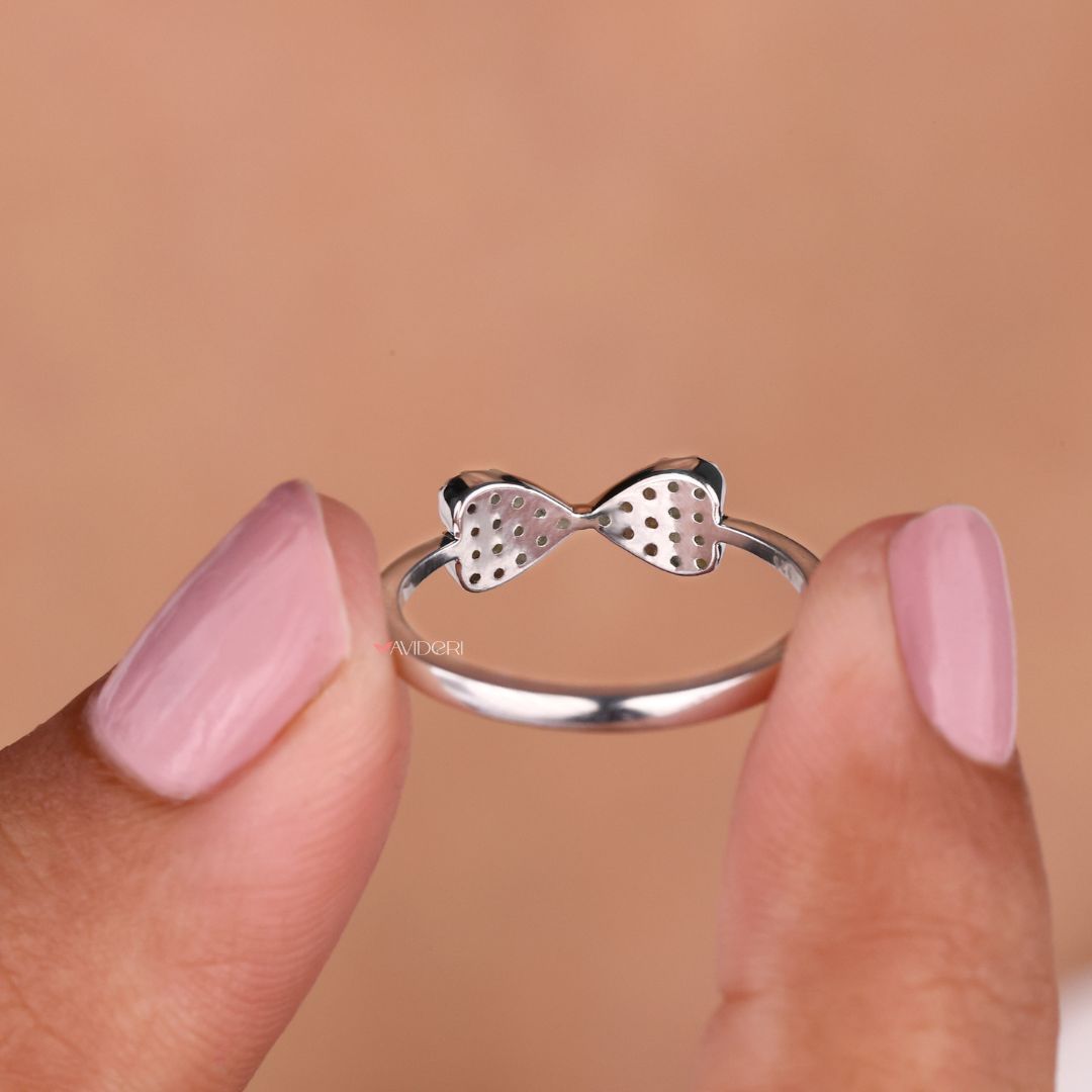Bow style ring with a unique and elegant twist